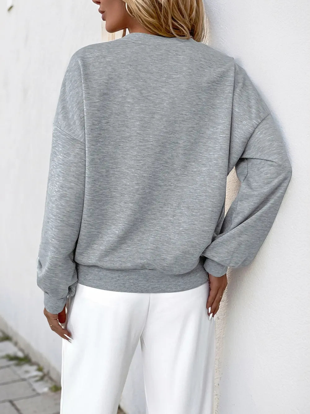 Perfee Cutout Pearl Round Neck Long Sleeve Sweatshirt - Ramm Clothing Ink