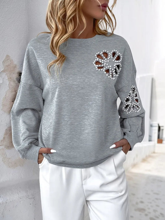Perfee Cutout Pearl Round Neck Long Sleeve Sweatshirt - Ramm Clothing Ink